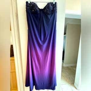 Beautiful strapless gown with beading across breast